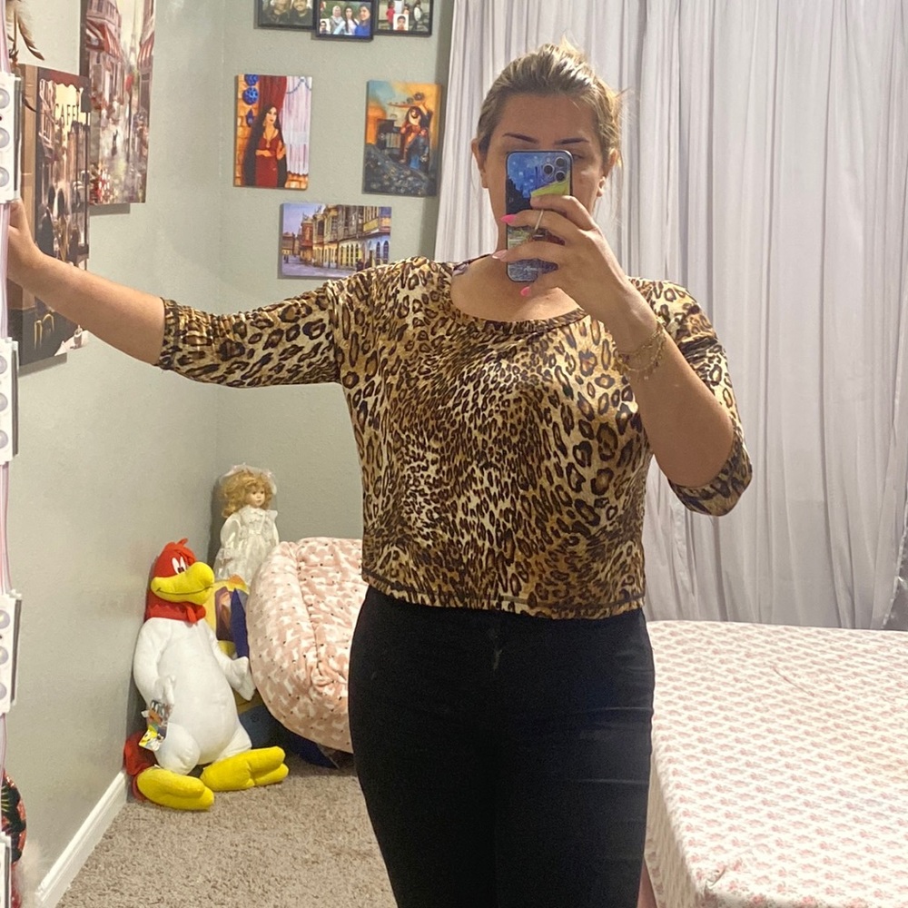 It’s tiger print top, very luxury, wore it only once. elegant and high quality